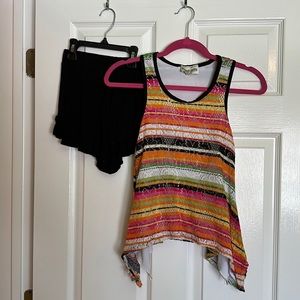 I purchased outfit to wear as set. Top size 10 shorts size 10/12. So cute on.